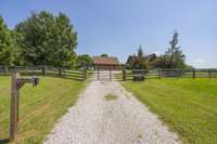 This is a very private setting at the top of the hill and end of the lane, with an automatic gate for added privacy