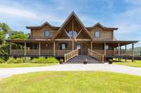 Wow, welcome to 5018 Remus Lane, a beautiful log home lovingly built by the current owners with painstaking detail.
