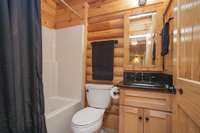 Downstairs guest bath with easy access to the home office
