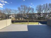 Upper level Sun Deck off of Bonus Room !   Built By: Insignia Homes    photo taken: 2/23/24. *this home is under construction