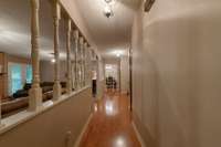 View from end of hallway toward formal dining room.  The hardwood is beautiful!