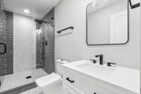 The full bath is equipped with a walk-in shower.