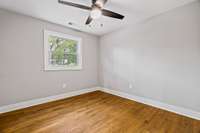 This bedroom offers a nice size window and custom closet and is right across the hall from the full bath.