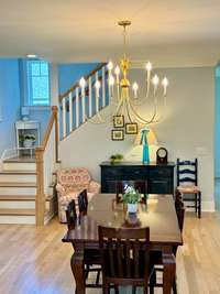 This lovely dining area off of the kitchen provides ample space for your family table and china hutch!