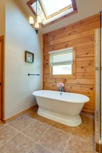 Deep PORCELAIN TUB with tile floor