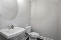 Half Bathroom for your guests!   *Sample Photo Only