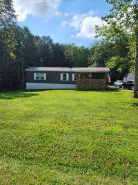 Nice front yard and covered front deck!