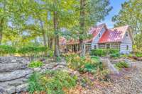 This Stately Log Home Is Graced Throughout With Rustic Details. It Boasts Over 4,500 SF And Can   Accommodate 10+ Guests And Features A Gorgeous Pool And Spa Area In Back.