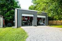 Brand new 24x30x12 shop installed by the owners last year! 10' roll up doors, metal construction and an all new gravel drive! Also a shed to the left, with electricity, will convey!