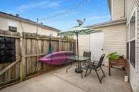 Heading outside, the privacy-fenced patio is a great relaxing and entertaining space.