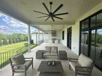 Spacious rear porch with Grill Station.