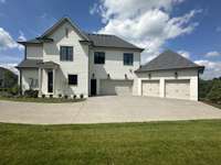 4-Car Garage with Friend's entrance, side and rear pedestrian doors