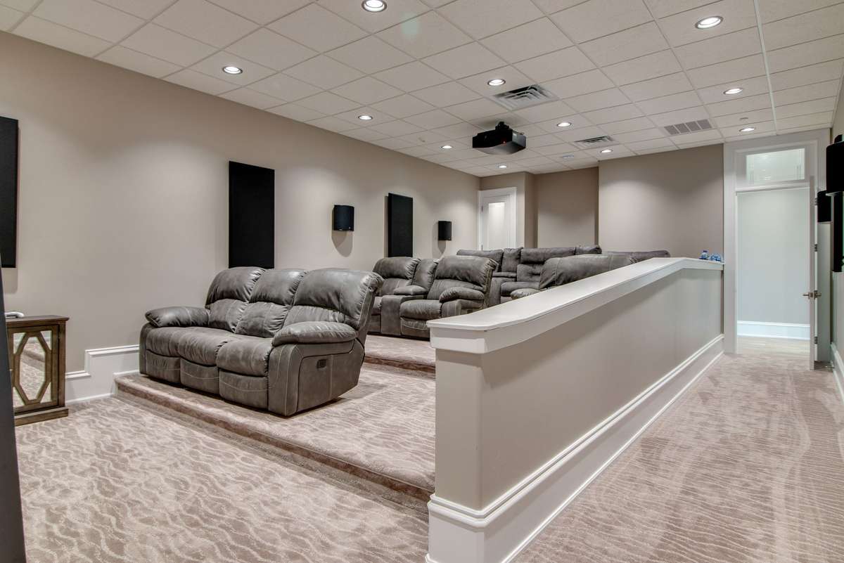In-keeping with the theme of entertainment, this home theater is a movie-lover's dream.