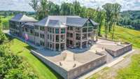 This home was designed to take full advantage of it's lake view from it's perch high above Dale Hollow Lake.  To accomplish this, there are multiple patios, porches and sun rooms - each with their own amazing vantage points of the water.