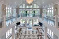 The second level halo balcony overlooks the marble-filled grand hall.