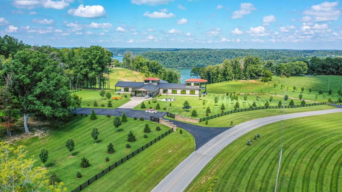 The estate of Grand View Manor consists of 63 park-like acres and three buildings - The grand manor, the guest/office quarters and a auto shop.