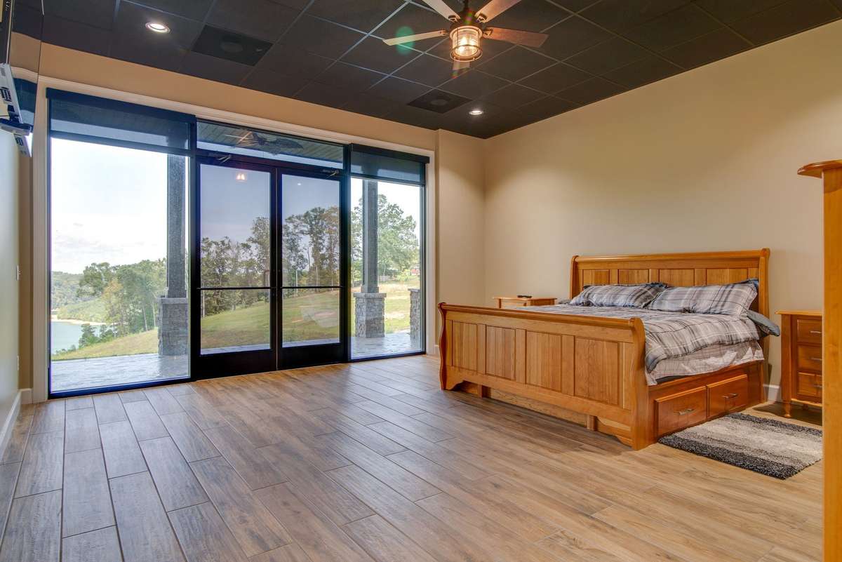 The lower level bedrooms have direct access to balconies which have views of Dale Hollow Lake.