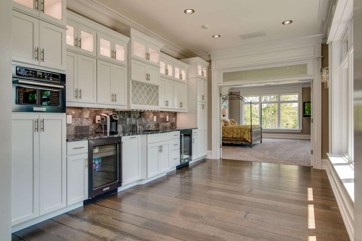 No detail was left out in the manor's design.  There are two secondary kitchenettes which serve the guest bedrooms for those moments when you crave a light snack or want to start your day with a cup of coffee.