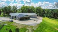 There are several garage doors allowing for easy access to much of the building.