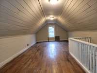 This is the finished attic area or bedroom #3. It has a half bath.