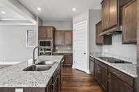 This Nissi Kitchen Layout was previously built by Dalamar Homes.