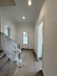 View of rear Foyer/Friend's Entrance and rear Staircase