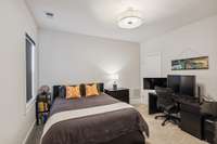 3rd Bedroom with large walk-in closet and access to walk-in attic space/storage.