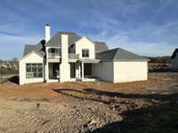 Great size backyard for a pool and play area.  Full sod and irrigation included. *this home is under construction  Photo taken 3/17/24