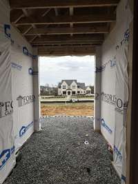 View of Covered Front Entry *this home is under construction Photo taken: 1/8/24