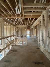 View of upper landing and large linen closet *this home is under construction Photo taken: 1/8/24