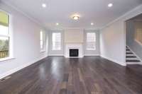 Spacious Great Room with lots of natural light. Photo is of a similar floor plan, not actual home.