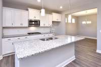 Kitchen with large Island. Photo not of actual home.