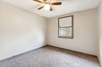 Bedroom #1 has brand new carpet, ceiling fan, trim, and blinds.