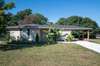 Mature landscaping in front and backyards of this amazing renovated home!