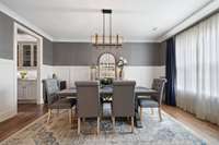 An elegant formal dining room is ready to help you host dinner parties and holidays!