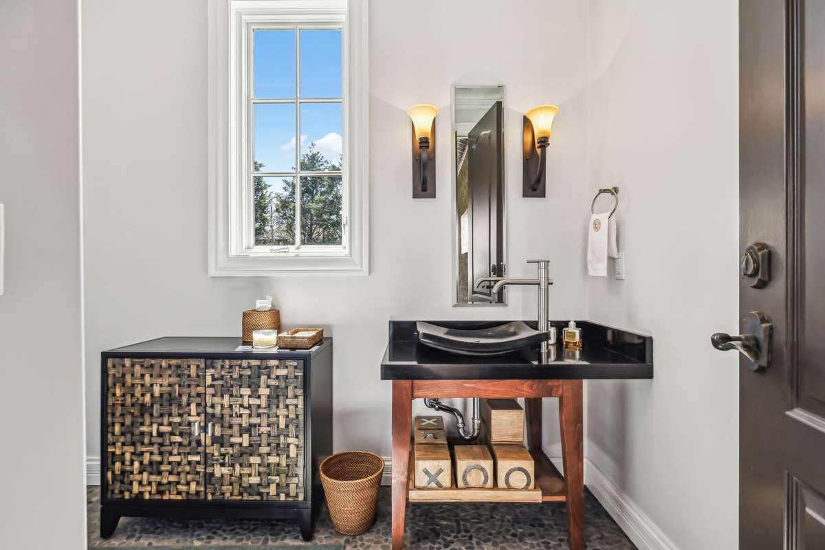 And just off the veranda, the Powder Room offers the perfect potential for a future Pool Bath, combining convenience and function.