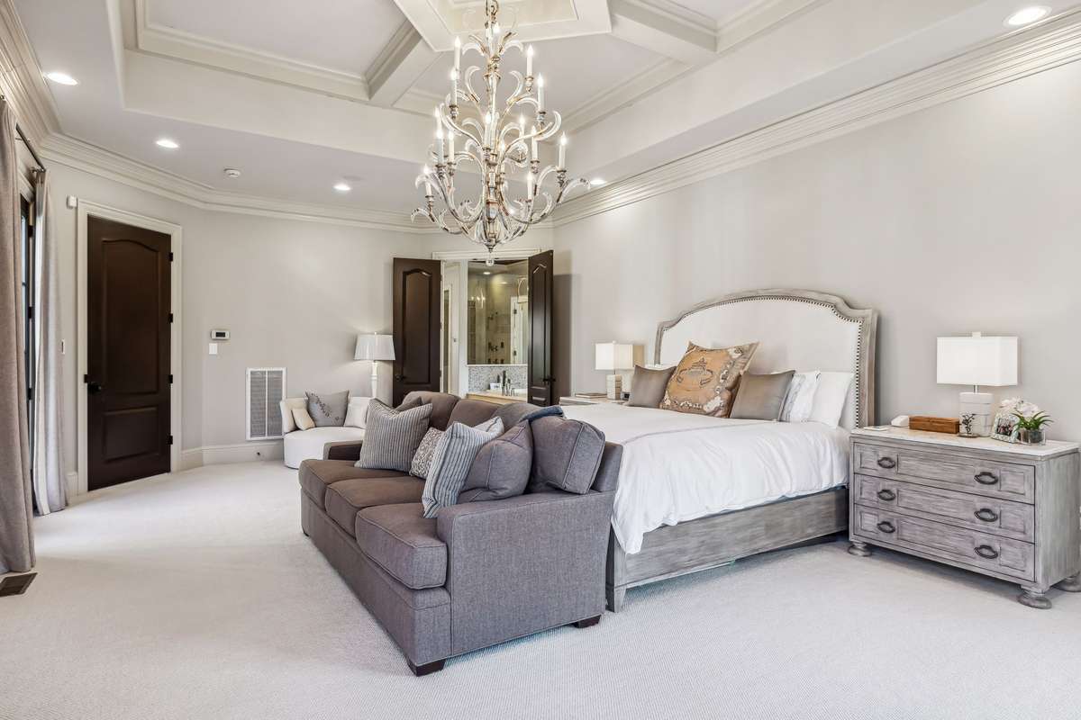 Every detail speaks to comfort and sophistication, from the plush 100% wool Berber carpet with memory foam padding underfoot to the Hunter Douglas automated blackout shades that ensure restful nights.