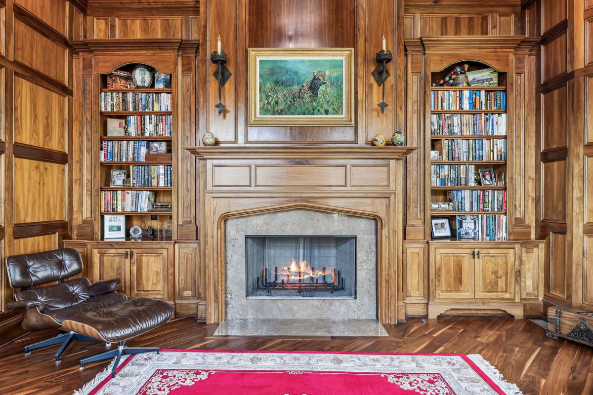 With ample space for a substantial desk, a fireside sitting area, this Study is as functional as it is impressive—a true executive retreat right at home.