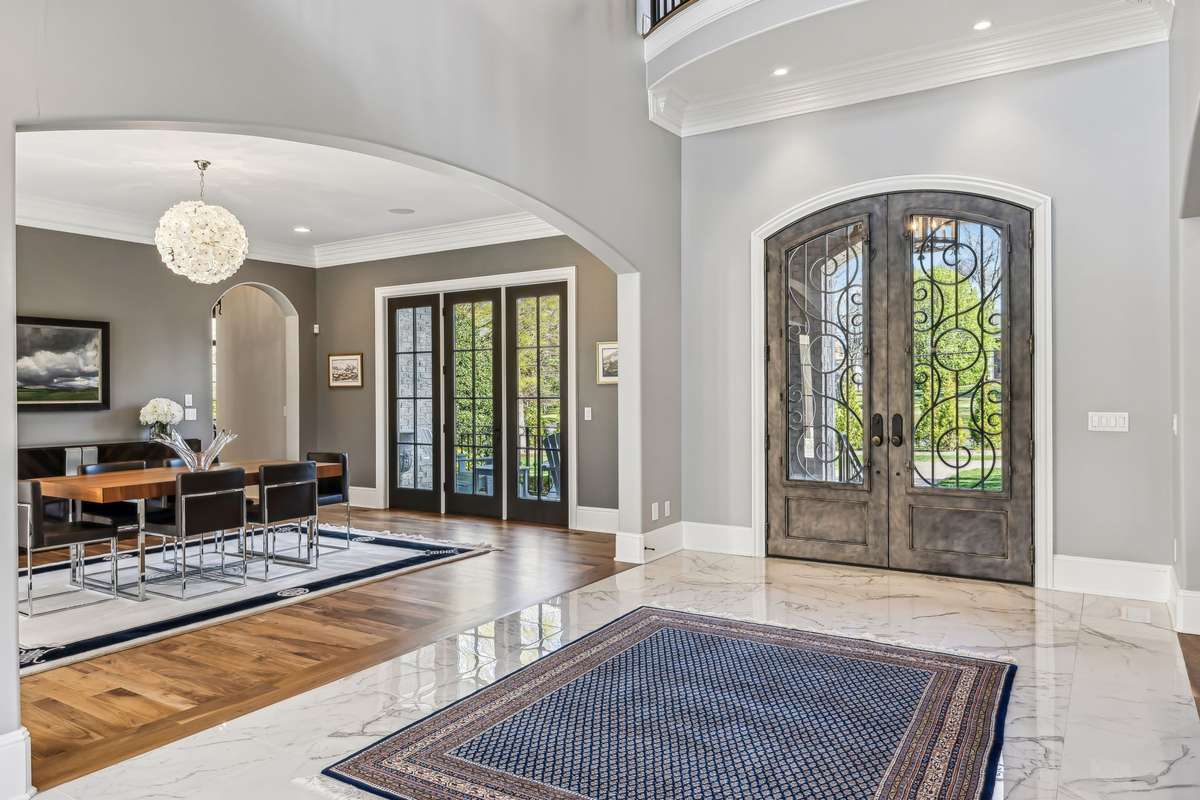 Rich walnut floors flow seamlessly throughout the home, adding warmth and depth to every step.