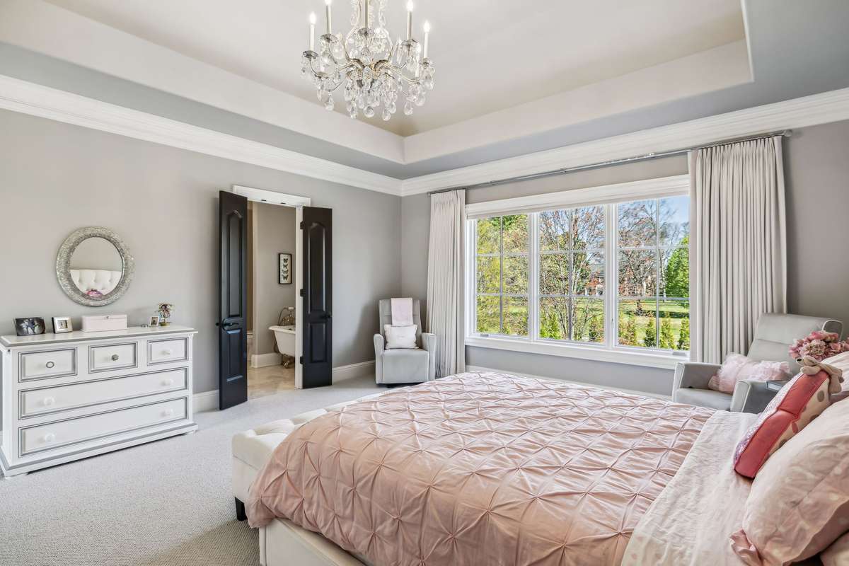 Additional highlights include a generous walk-in closet and a private ensuite bath, making this space both stylish and functional.
