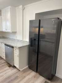 Kitchen view 3, new dishwasher and refrigerator