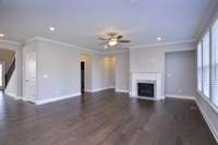 Great Room with lots of windows for natural light. Similar floorplan, not actual home