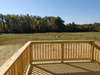 Deck overlooking the property. This lot has such opportunity!