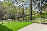 A portion of the side yard has turf for furry friends. The fenced side yard is  the perfect spot for pups or kids to roam around.