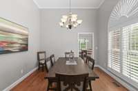 On the opposite side of the office you'll find a  formal dining room.