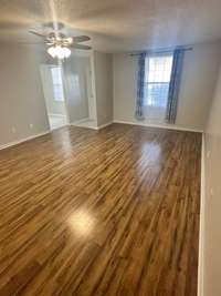 Another view of the Living Room looking towards the stairway to the 2nd Floor.