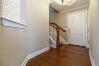 Foyer area with coat closet