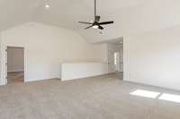 Large loft bonus room at the top of the staircase