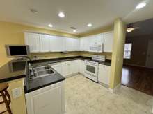 Spacious Kitchen With Stove, Microwave And Dishwasher (Refrigerator Does Not Remain)