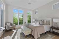 Primary Bedroom with 8' windows and treetop views